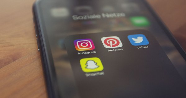 A smartphone displaying social media apps