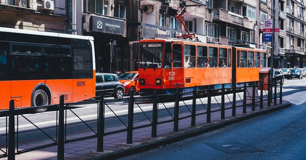 Rainbow flags flying above a city street in Belgrade