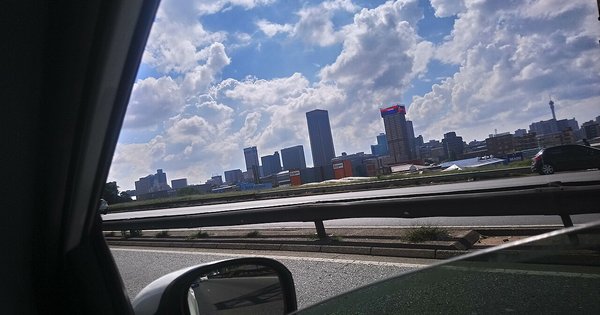 The Johannesburg skyline under an open sky