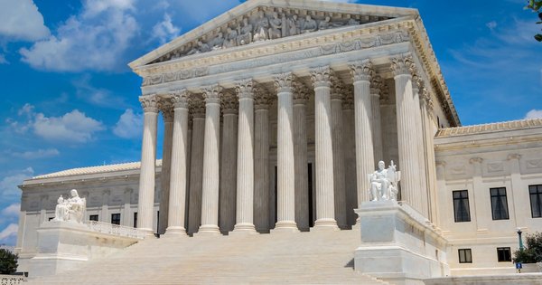 Exterior of a federal courthouse building with columns