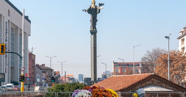 Independence Square in central Sofia, Bulgaria, with pedestrians and historic buildings