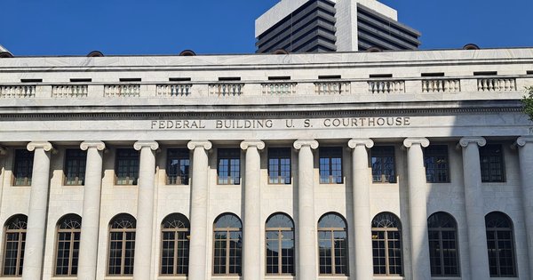 Exterior of a federal courthouse building with columns
