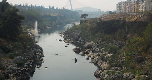 The Morača river running through Podgorica, Montenegro, with the city beyond