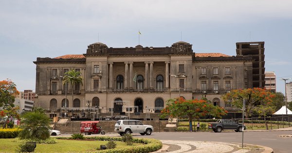 Maputo's colonial-era City Hall on Independence Square, with flame trees in bloom in front