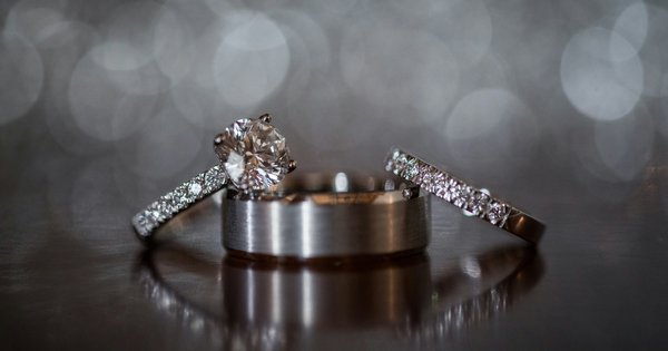 Two wedding rings resting together