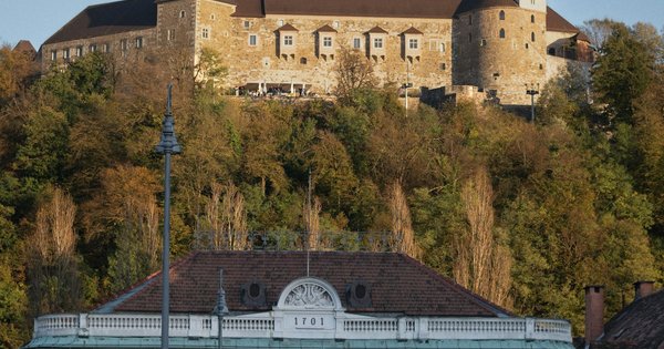 Ljubljana's old town and castle hill viewed across the river