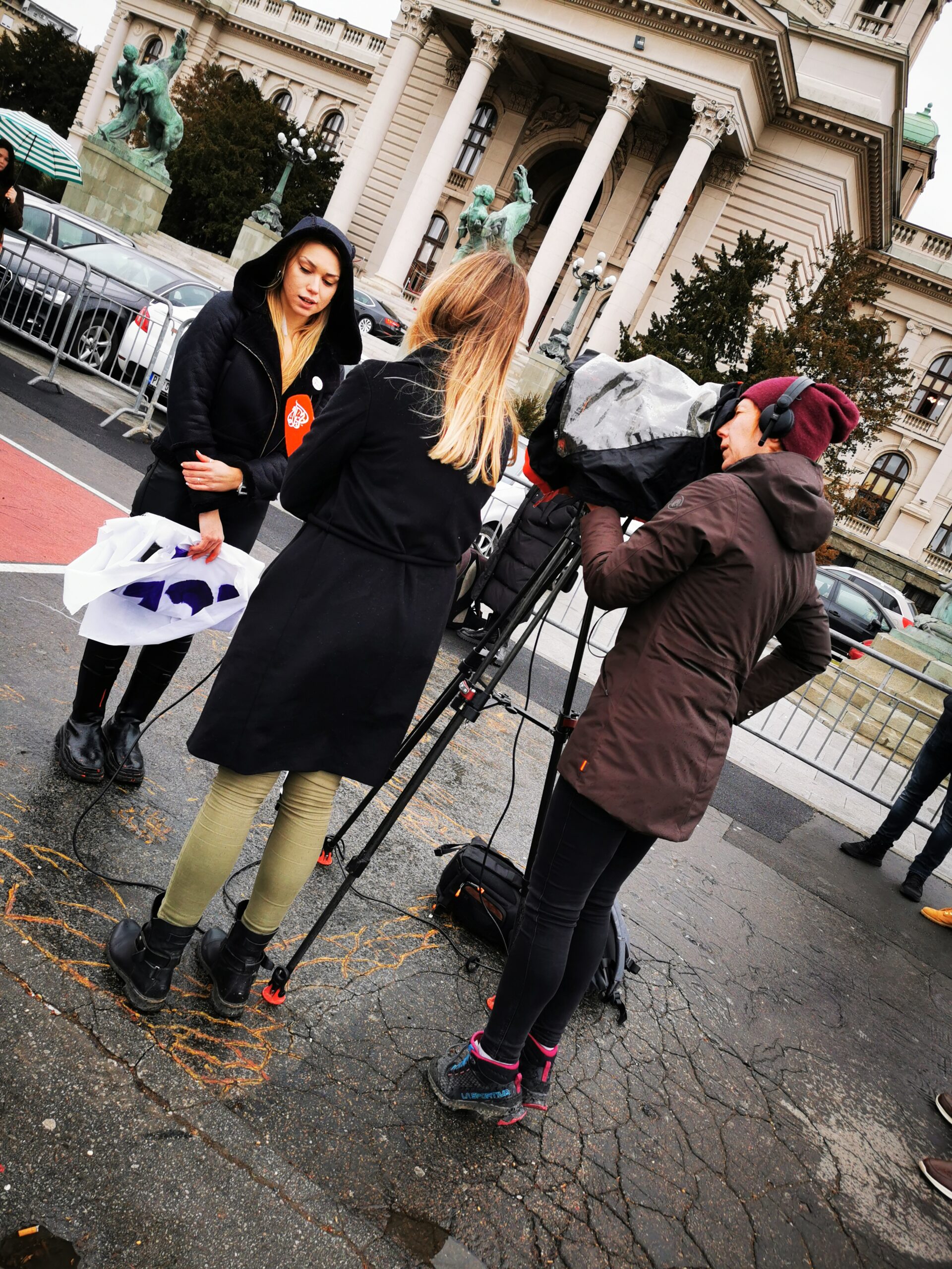 One protester was interviewed by a journalist in Belgrade, Serbia.