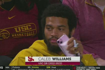 College football star Caleb Williams riles homophobes with pink phone, pink wallet and pink nails