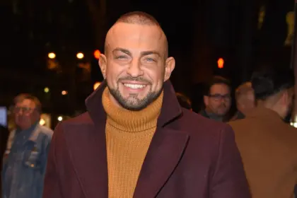 Strictly star Robin Windsor buried in private funeral as mourners attend with rainbow umbrellas