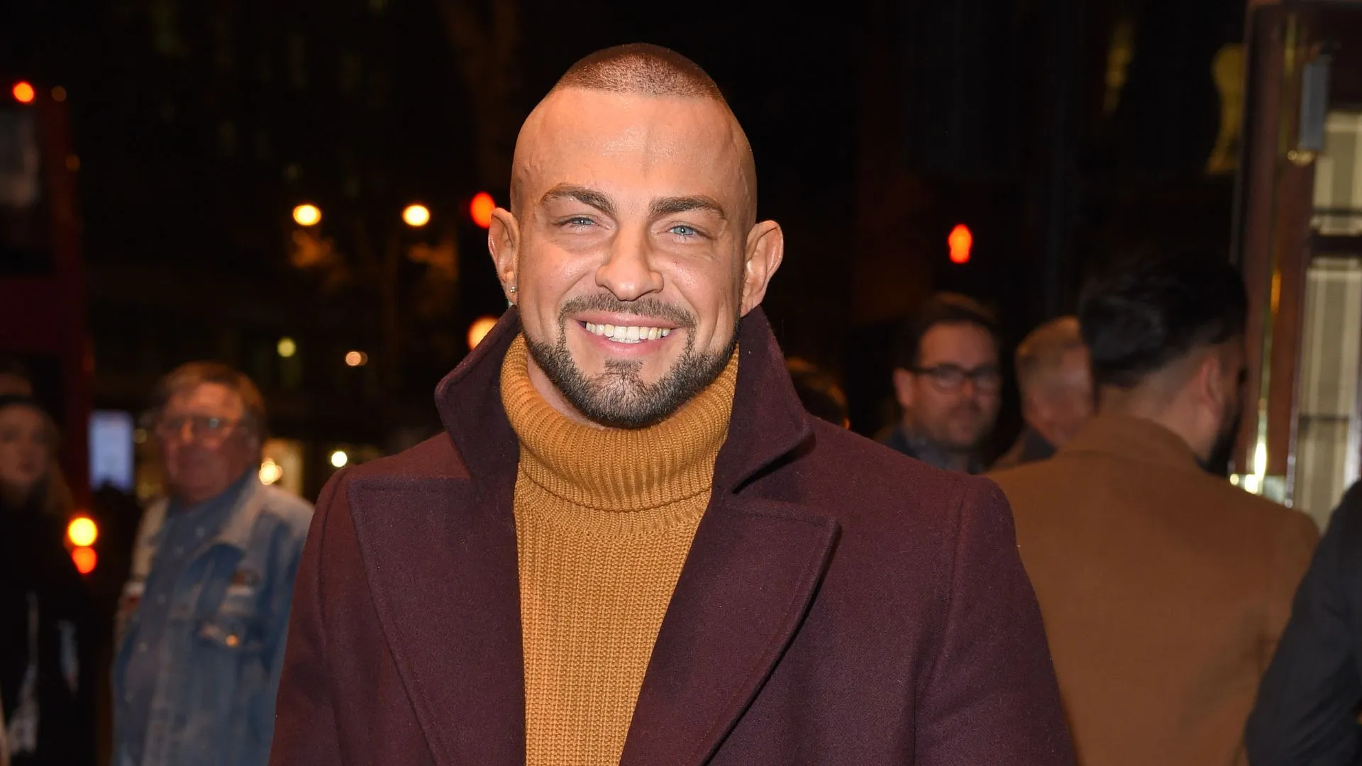 Strictly star Robin Windsor buried in private funeral as mourners attend with rainbow umbrellas